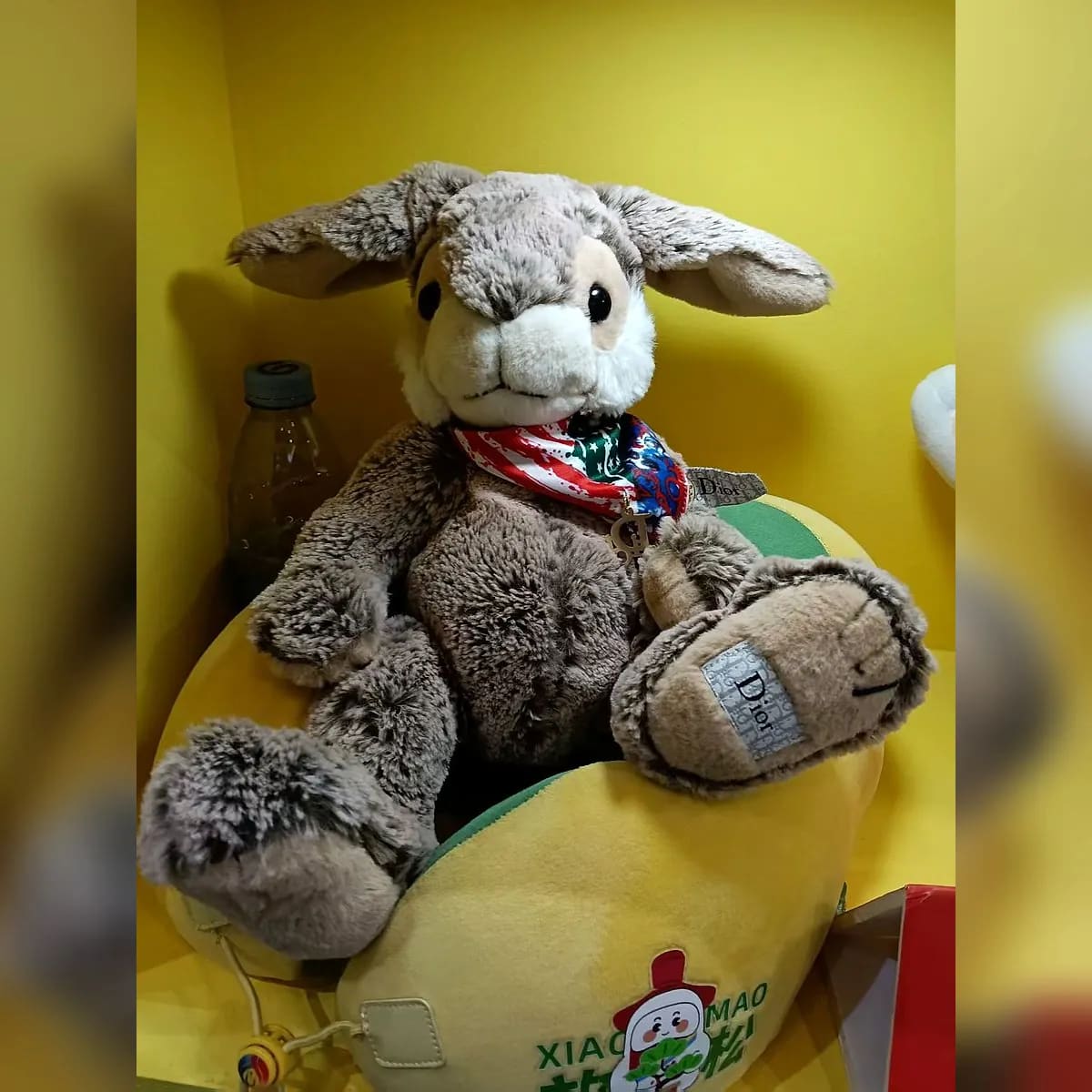 Seated grey rabbit plush — custom plush toys manufactured in Shenzhen by Custom Plush Toy Factory