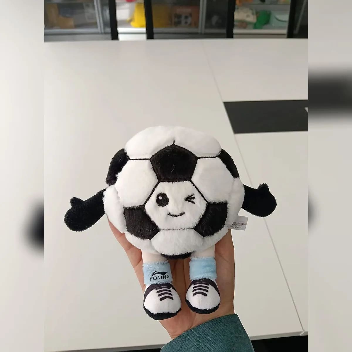 Football plush keychain — custom keychains manufactured in Shenzhen by Custom Plush Toy Factory
